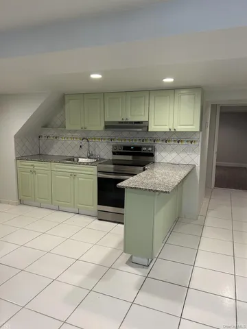 a house with a potted plant