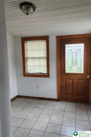 a bathroom with a toilet and a sink