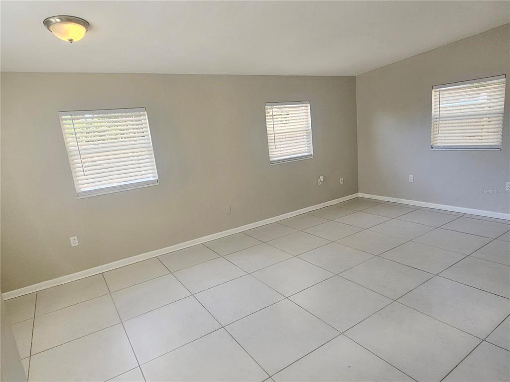 7000 Brentford Road Sarasota, FL 34241 - Photo 9 of 29 a view of an empty room with a window