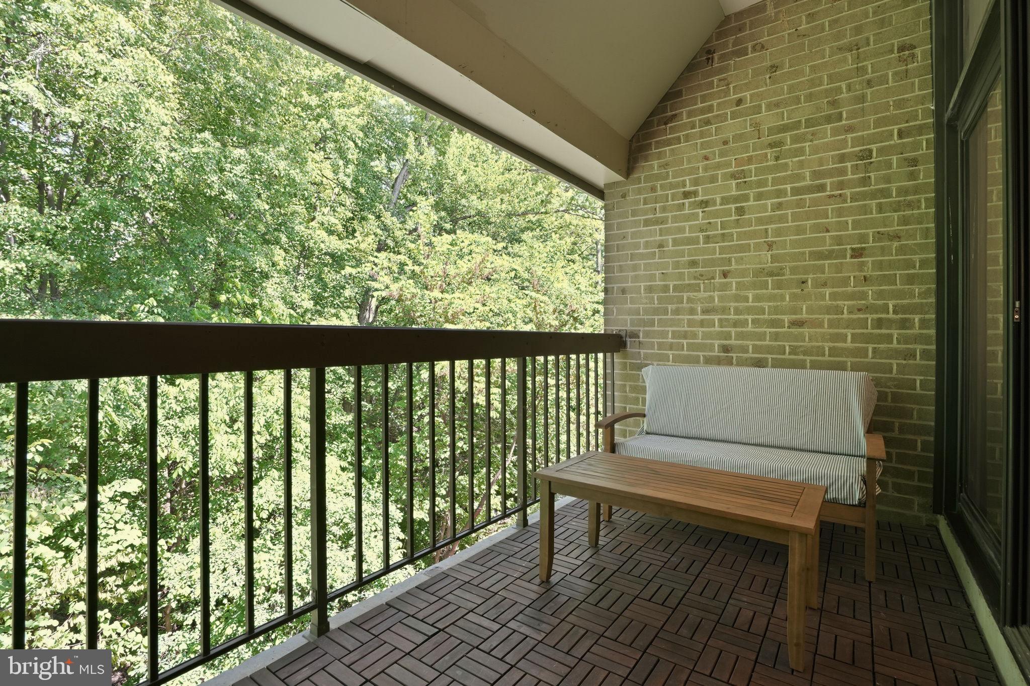 1663 Parkcrest Circle, Unit 5B/300 Reston, VA 20190 - Photo 19 of 21 Patio Overlooking Trees and Woods