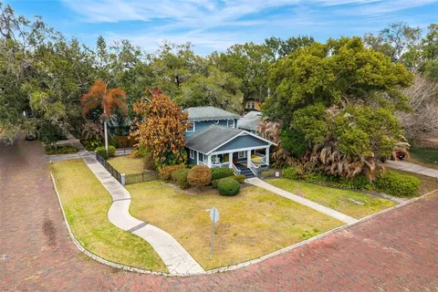 swimming pool view with a seating space