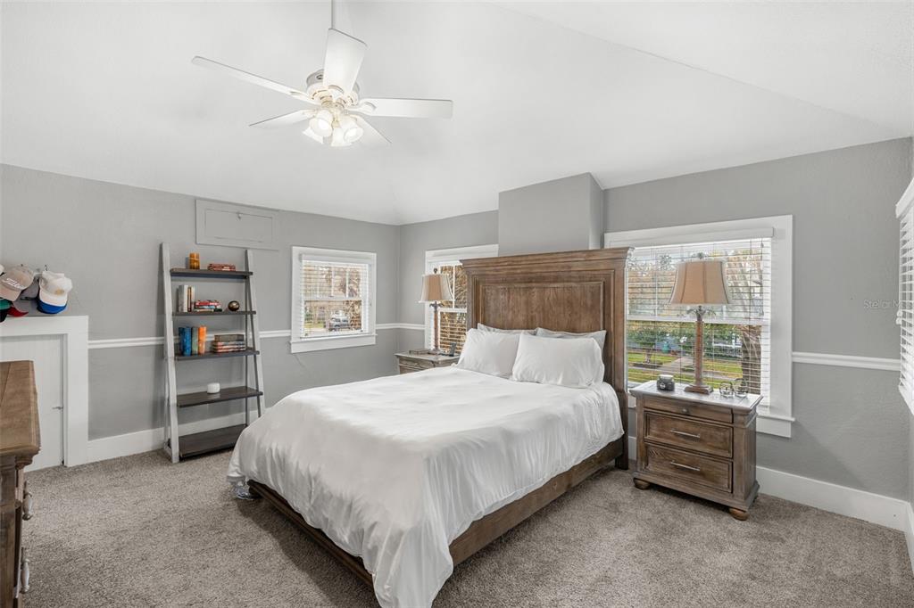 1003 East Jackson Street Orlando, FL 32801 - Photo 10 of 27 a bedroom with a bed and a window