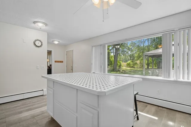 a living room with furniture and a area