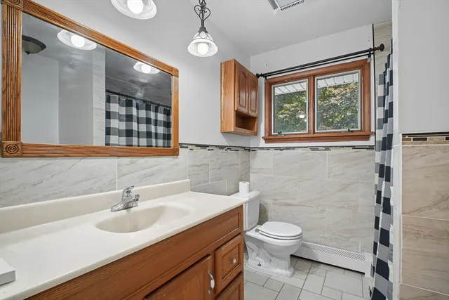 a view of a chairs and table in a room