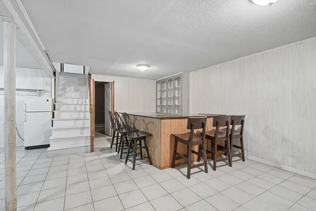 a view of a livingroom with furniture and furniture