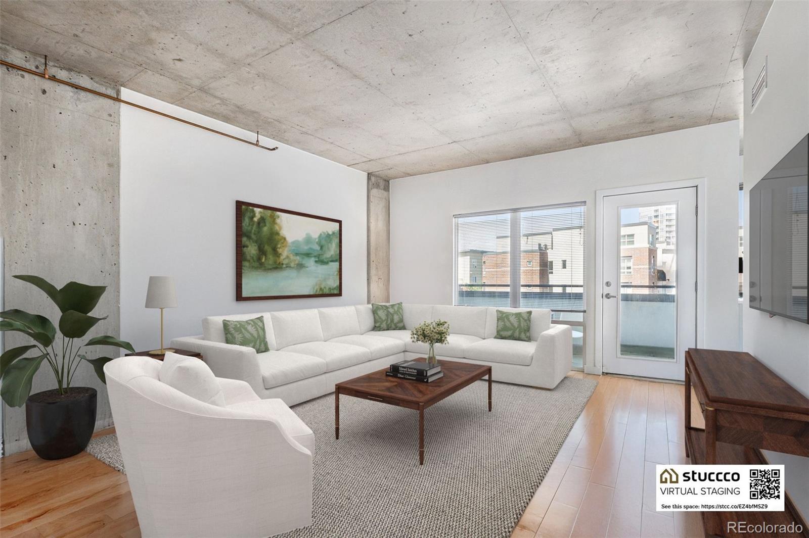 1475 Delgany Street, Unit 304 Denver, CO 80202 - Photo 6 of 28 a living room with furniture potted plant and windows