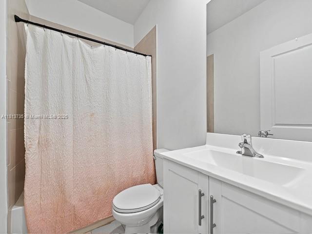 18058 Southwest 147th Court Miami, FL 33187 - Photo 19 of 27 a bathroom with a sink a toilet and a mirror