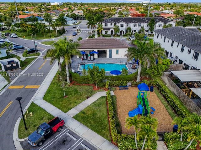 18058 Southwest 147th Court Miami, FL 33187 - Photo 23 of 27 an aerial view of a house with a garden and swimming pool