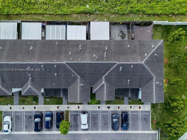 18058 Southwest 147th Court Miami, FL 33187 - Photo 24 of 27 a front view of house with yard and outdoor seating