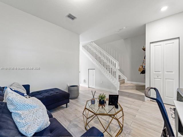 18058 Southwest 147th Court Miami, FL 33187 - Photo 3 of 27 a living room with furniture and wooden floor