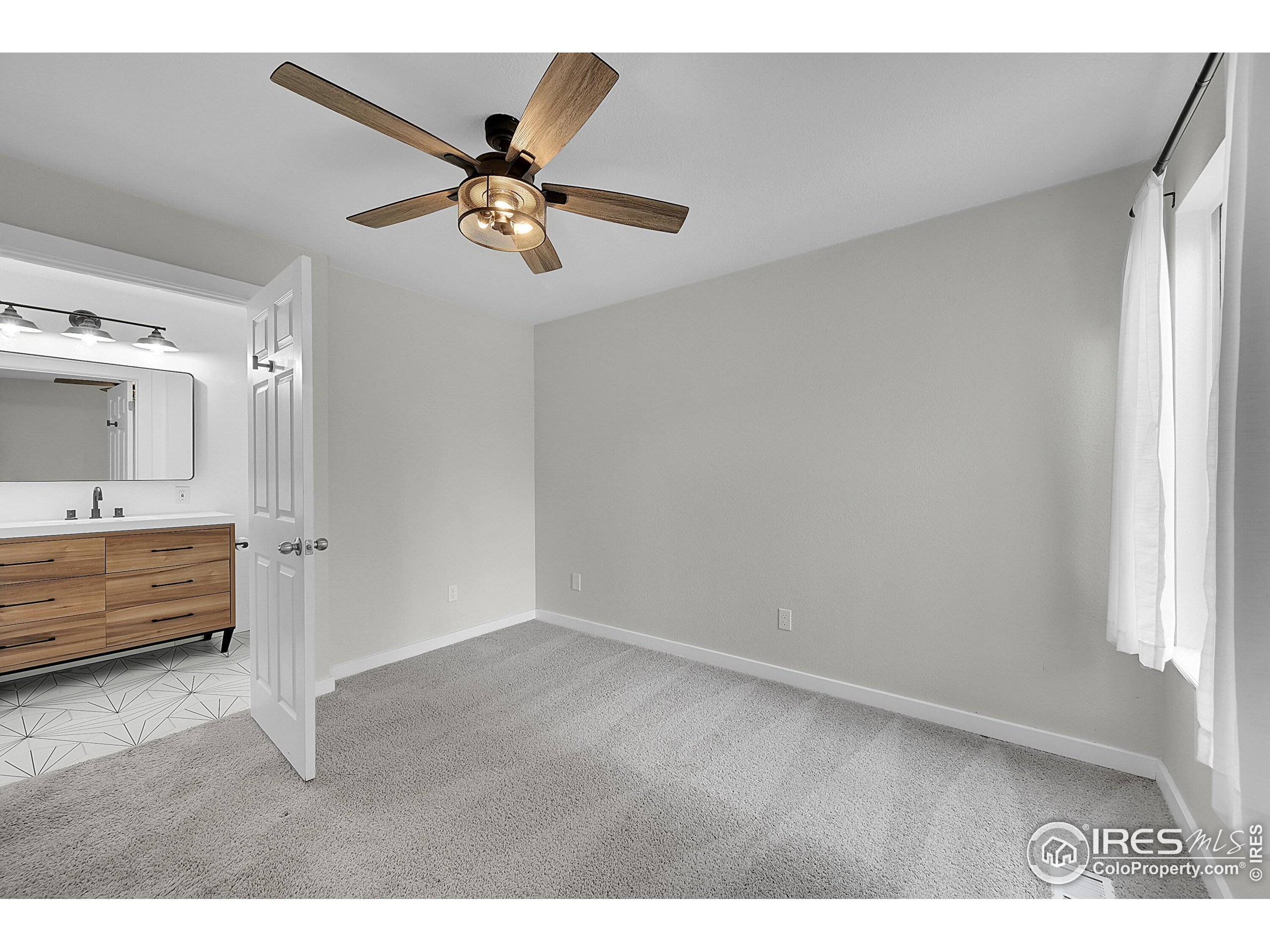 1836 Rice Street Longmont, CO 80501 - Photo 14 of 46 a view of an empty room and window