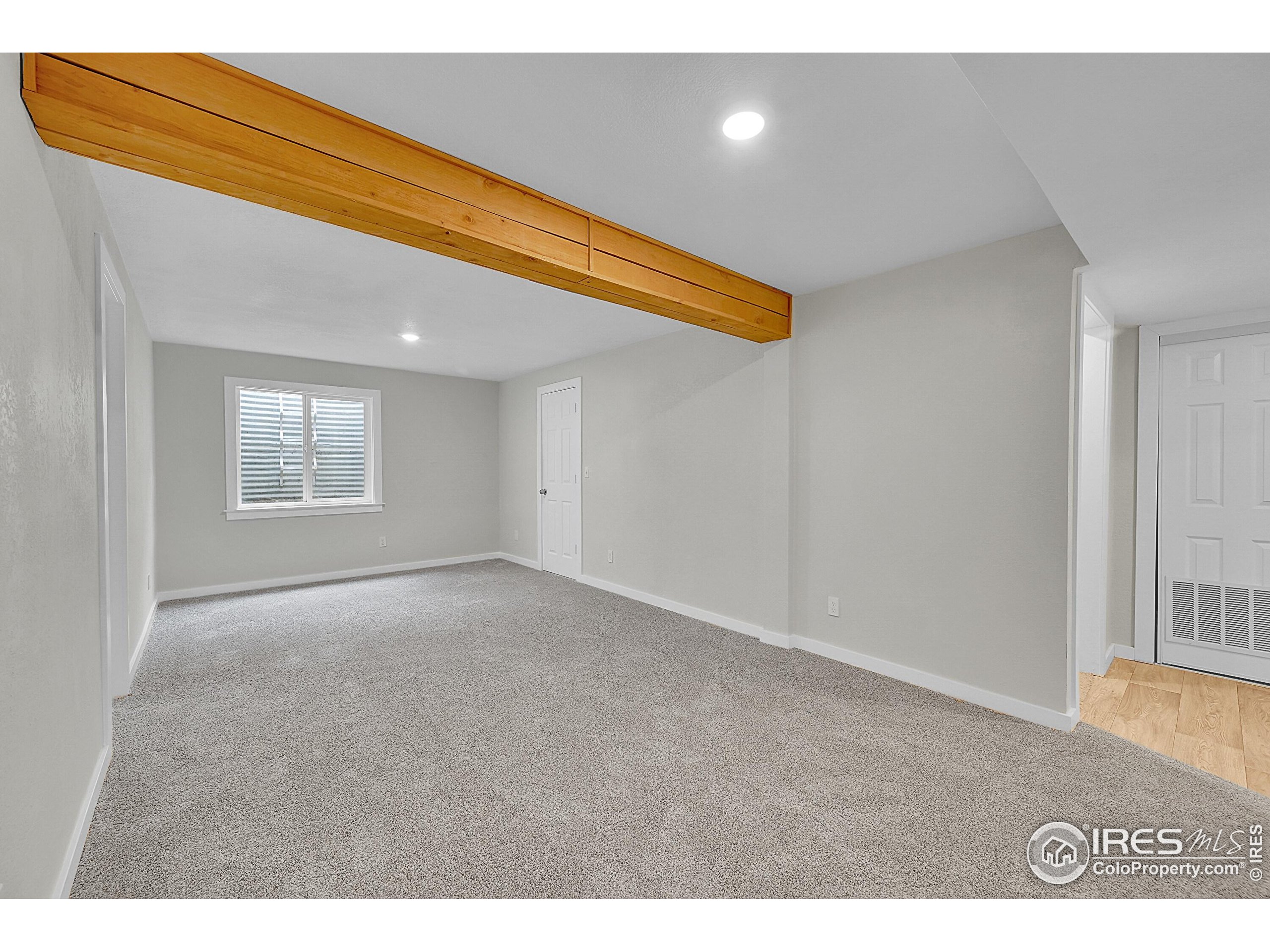 1836 Rice Street Longmont, CO 80501 - Photo 26 of 46 a view of an empty room and a window