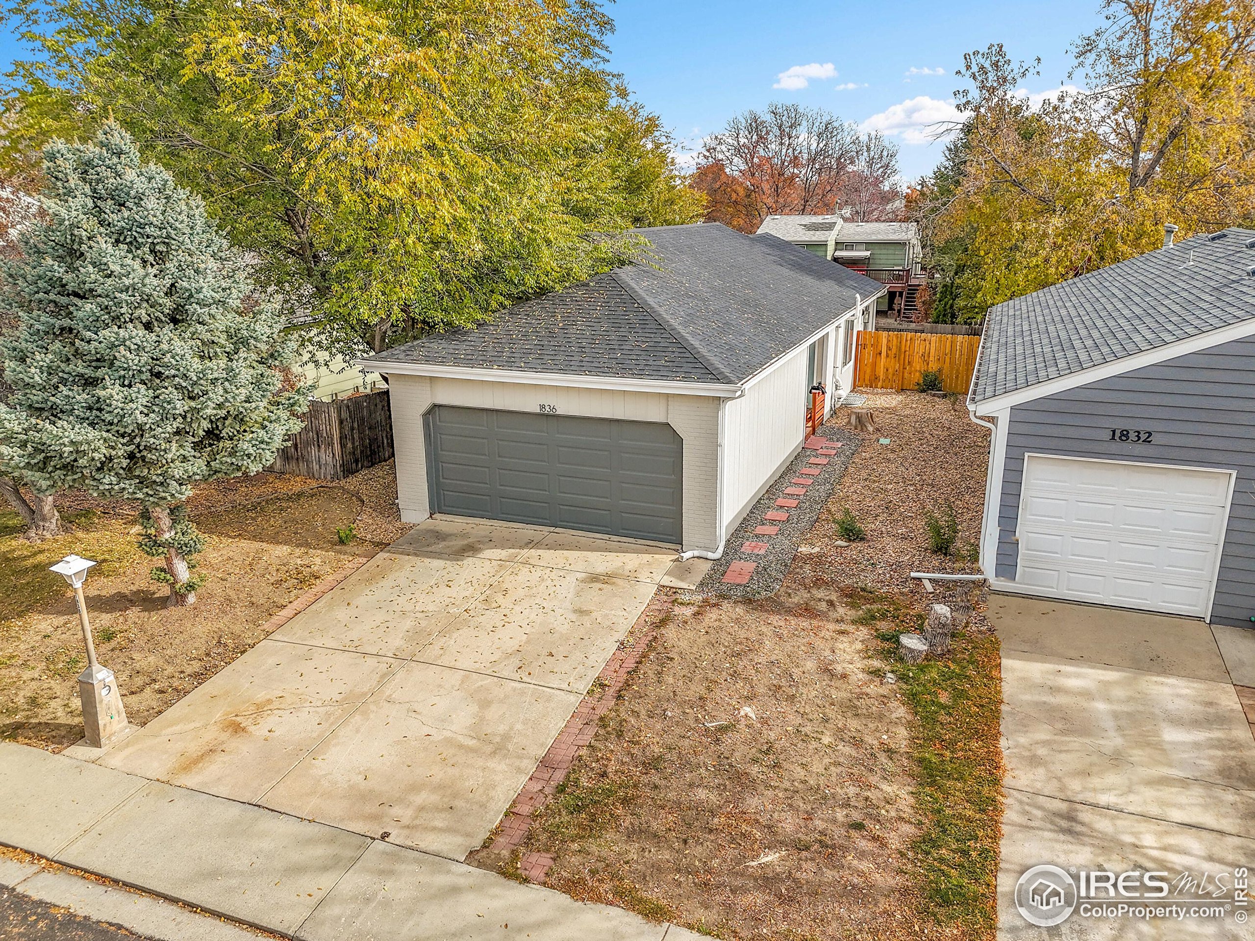 1836 Rice Street Longmont, CO 80501 - Photo 35 of 46 front view of a house with a yard