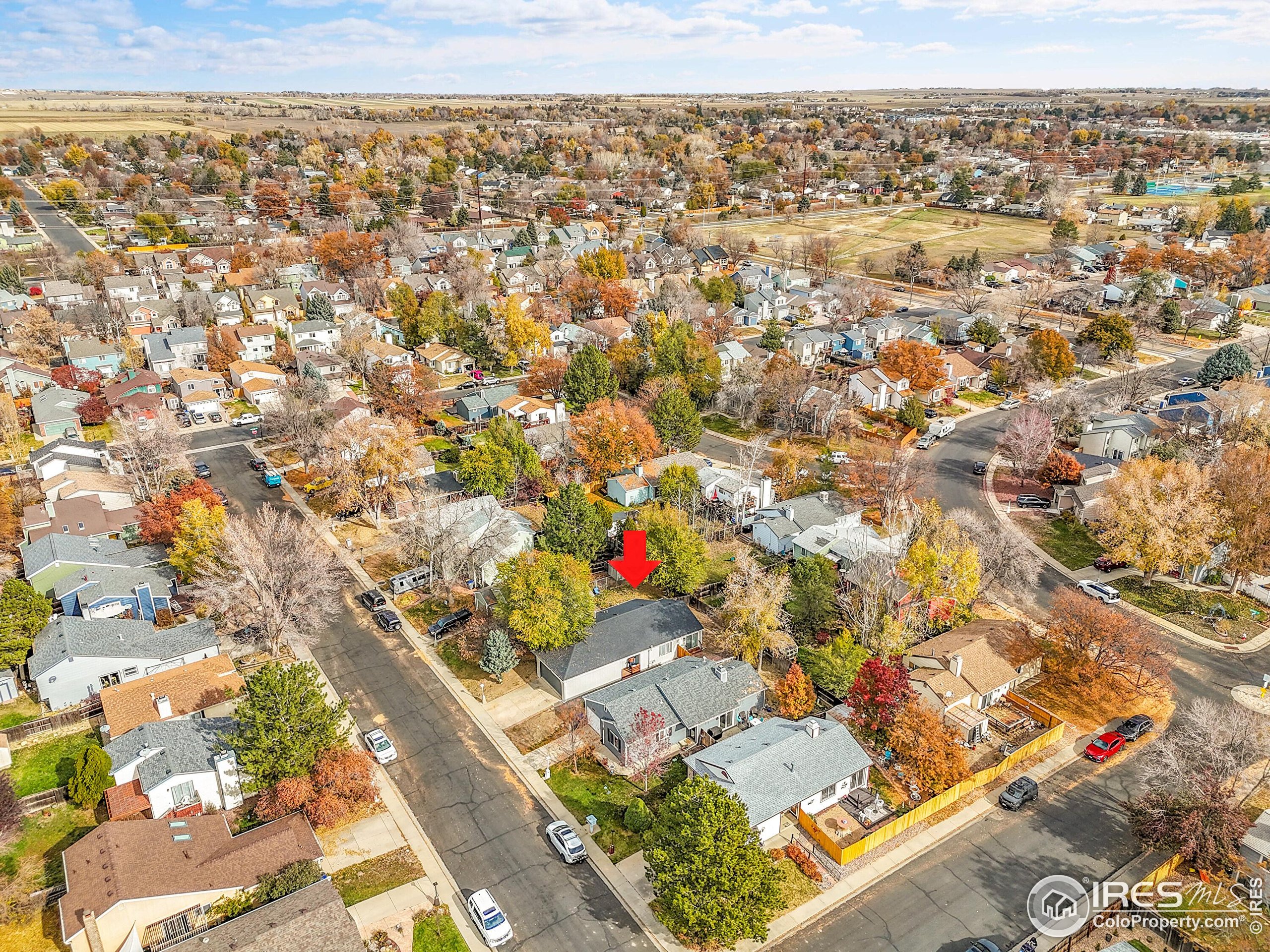1836 Rice Street Longmont, CO 80501 - Photo 43 of 46 an aerial view of residential houses with outdoor space