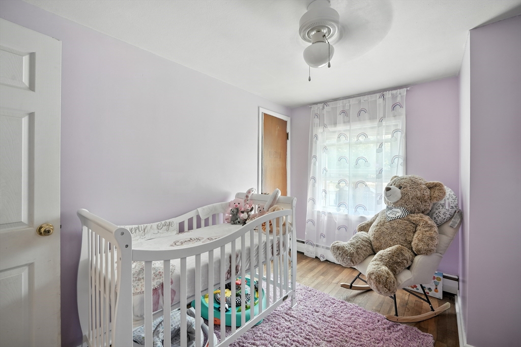 122 Drexel Street Springfield, MA 01104 - Photo 20 of 34 a living room with furniture and a large window