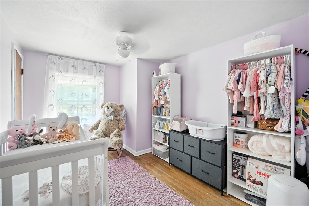 122 Drexel Street Springfield, MA 01104 - Photo 21 of 34 a bedroom with furniture and a window
