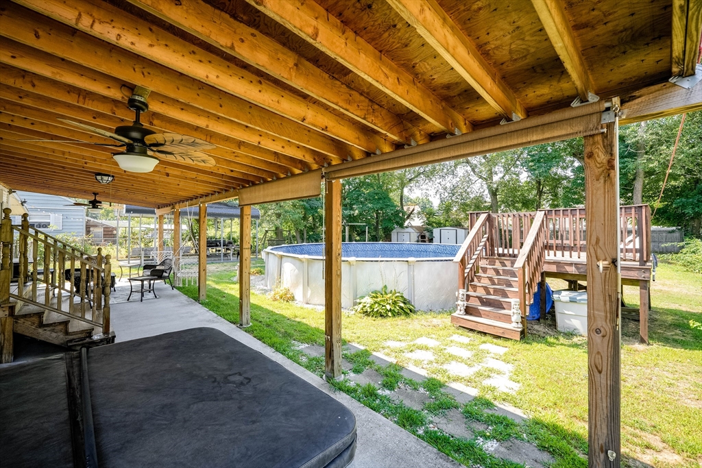 122 Drexel Street Springfield, MA 01104 - Photo 9 of 34 a view of a porch with chairs and backyard
