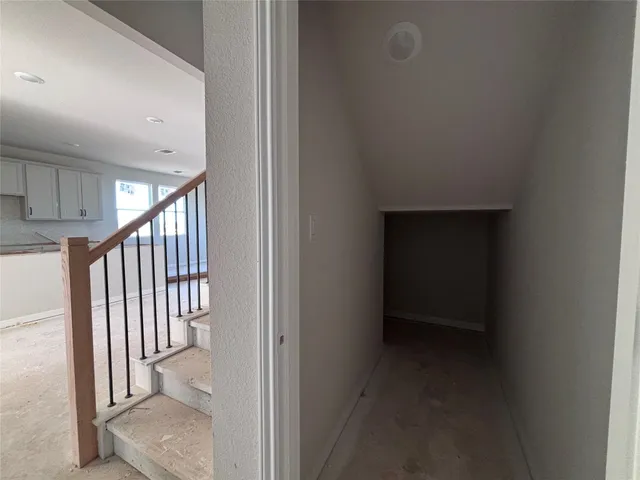 a view of a livingroom with a staircase