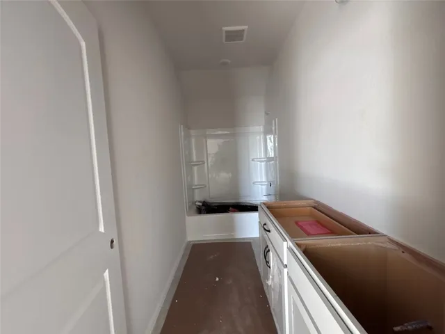 an empty room with an empty space