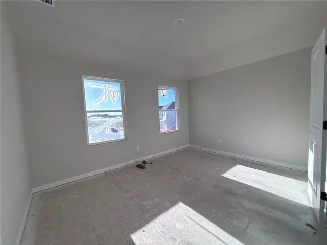 a view of a balcony with wooden floor