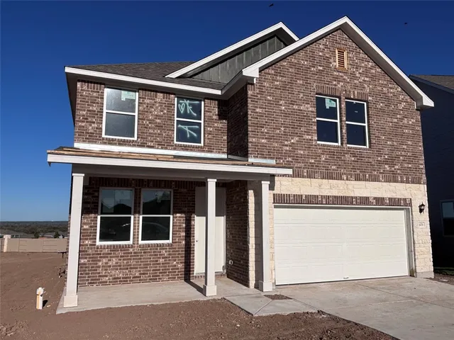 a view of a hallway with white walls