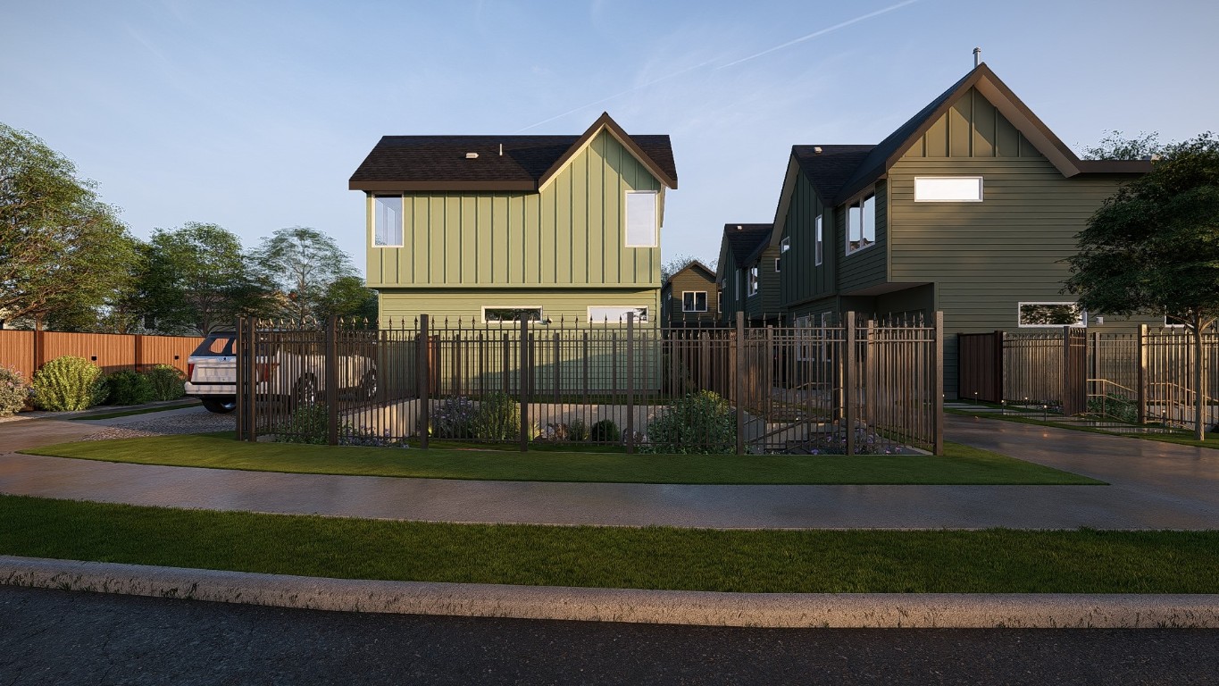 6409 Bradsher Drive, Unit 1 Austin, TX 78745 - Photo 2 of 26 a view of a house with a yard