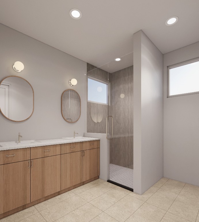 6409 Bradsher Drive, Unit 1 Austin, TX 78745 - Photo 6 of 26 a bathroom with a double vanity sink and a mirror