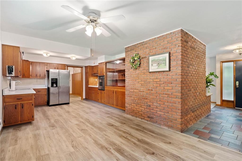 51 Lover Jonestown Road Charleroi, PA 15022 - Photo 12 of 24 a view of a kitchen with wooden floor and a kitchen