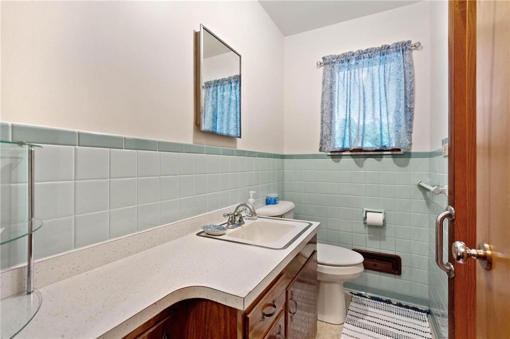 51 Lover Jonestown Road Charleroi, PA 15022 - Photo 14 of 24 a bathroom with a sink toilet and vanity