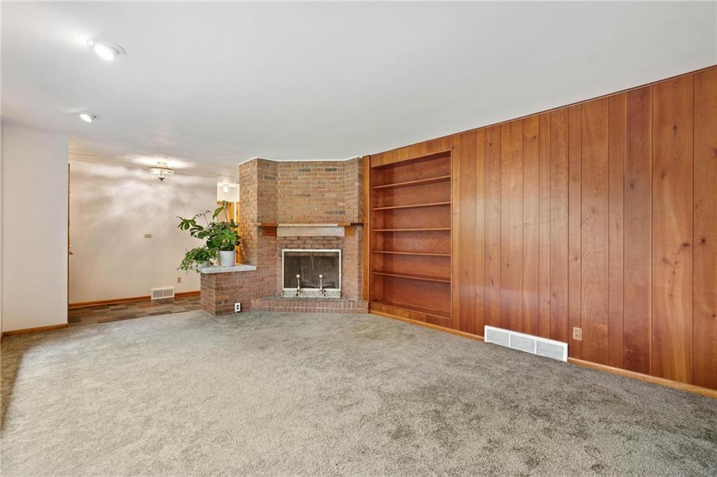 51 Lover Jonestown Road Charleroi, PA 15022 - Photo 4 of 24 an empty room with furniture and a garage