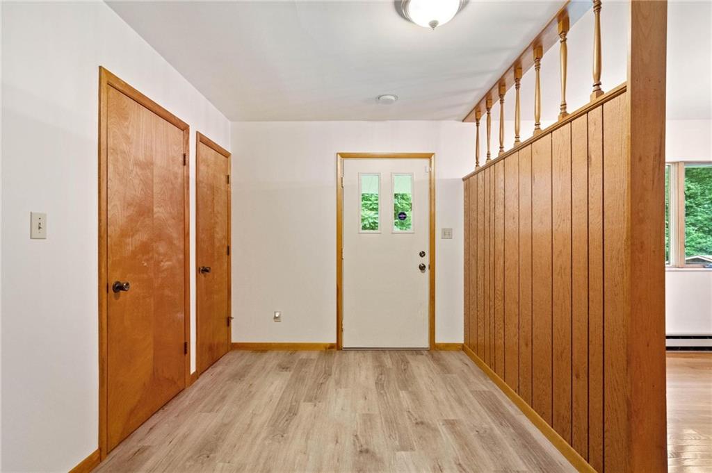 51 Lover Jonestown Road Charleroi, PA 15022 - Photo 5 of 24 an empty room with wooden floor and windows