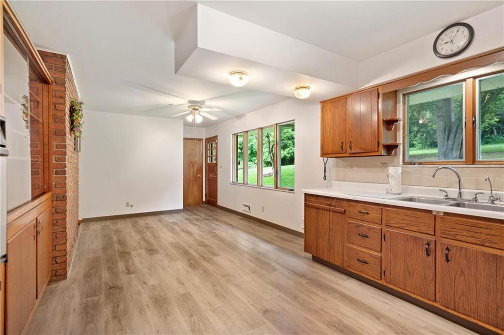 51 Lover Jonestown Road Charleroi, PA 15022 - Photo 10 of 24 a view of center island wooden floor and a window