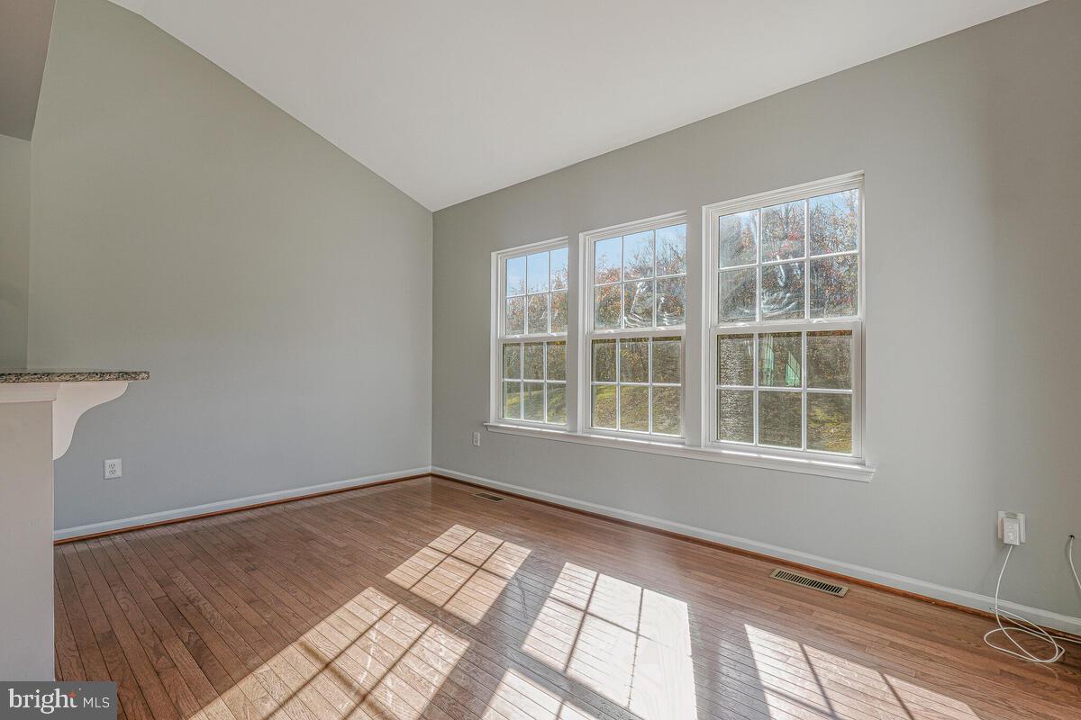 6911 Simmons Lane Clinton, MD 20735 - Photo 13 of 41 a view of an empty room with a window