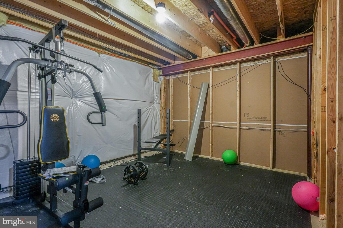 6911 Simmons Lane Clinton, MD 20735 - Photo 23 of 41 a view of a room with gym equipment