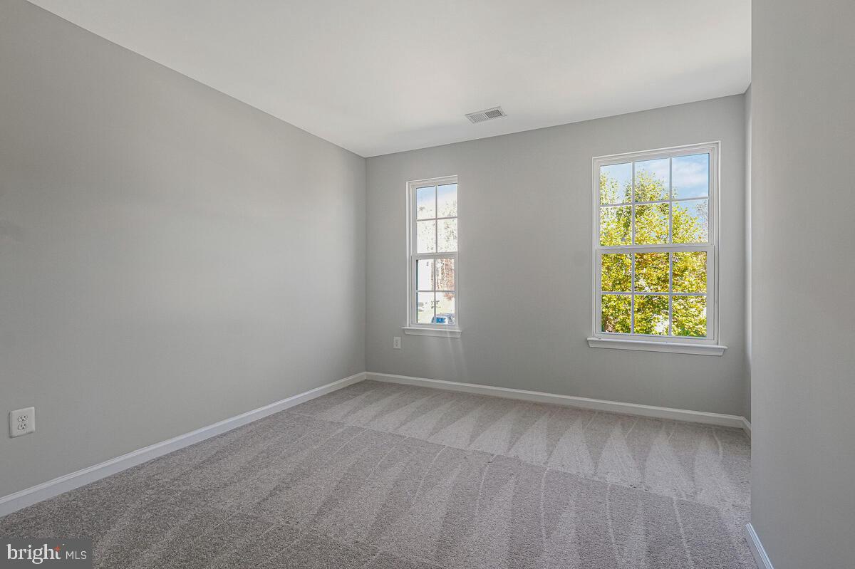6911 Simmons Lane Clinton, MD 20735 - Photo 30 of 41 an empty room with window