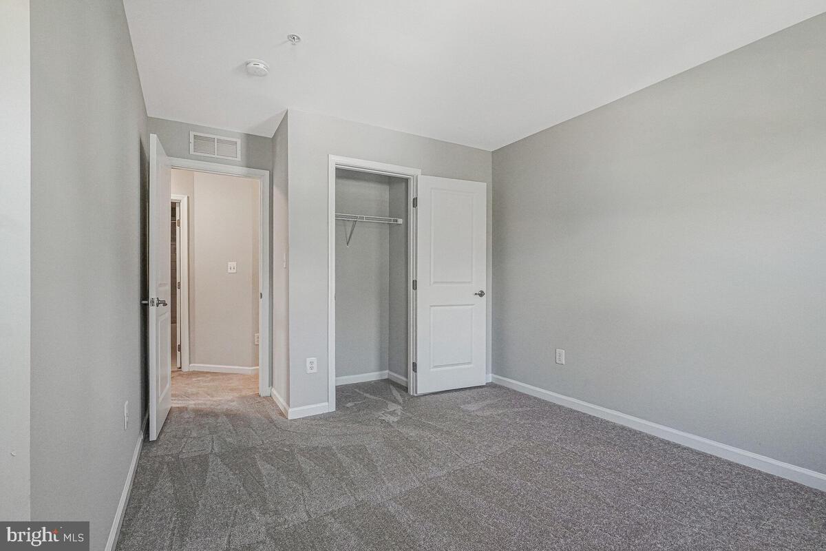 6911 Simmons Lane Clinton, MD 20735 - Photo 31 of 41 a view of an empty room
