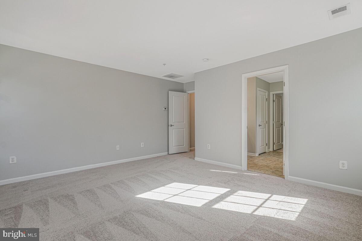 6911 Simmons Lane Clinton, MD 20735 - Photo 34 of 41 a view of an empty room