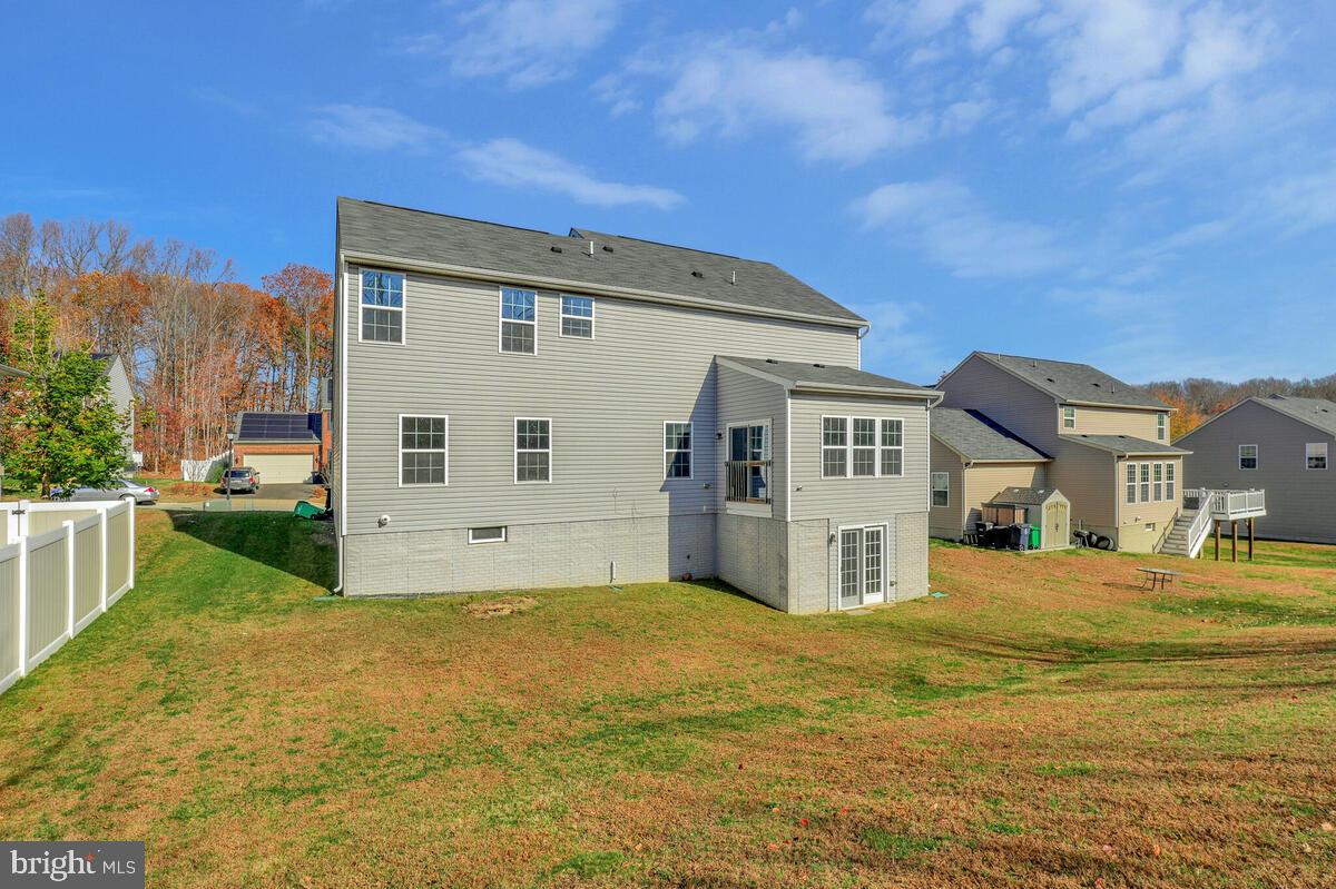 6911 Simmons Lane Clinton, MD 20735 - Photo 40 of 41 a view of a house with a big yard