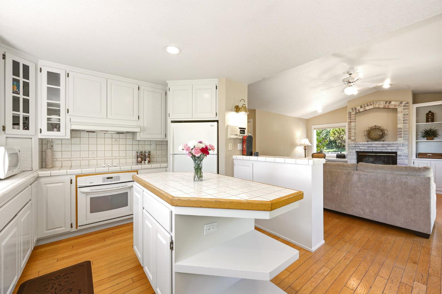 6380 Butterfield Way Placerville, CA 95667 - Photo 14 of 93 a kitchen with kitchen island a white counter top space and appliances