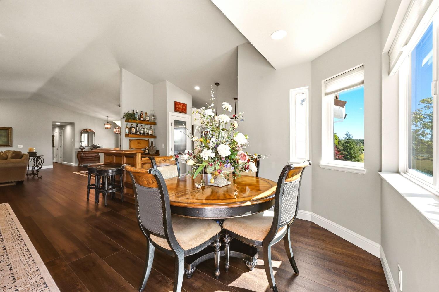 6380 Butterfield Way Placerville, CA 95667 - Photo 34 of 93 a dining room with furniture and wooden floor