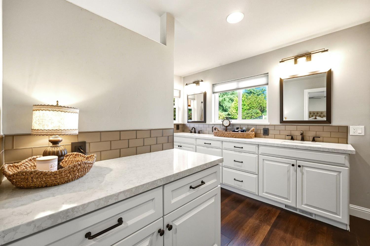 6380 Butterfield Way Placerville, CA 95667 - Photo 43 of 93 a spacious bathroom with a granite countertop sink and a mirror