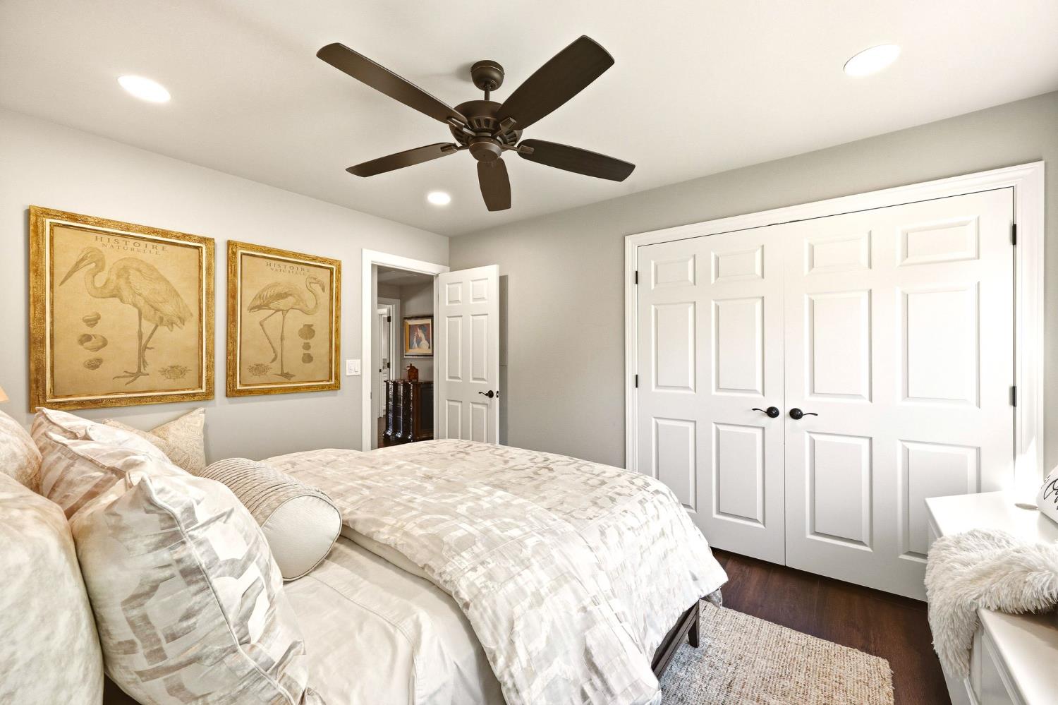 6380 Butterfield Way Placerville, CA 95667 - Photo 47 of 93 a spacious bedroom with a large bed a chandelier and a window