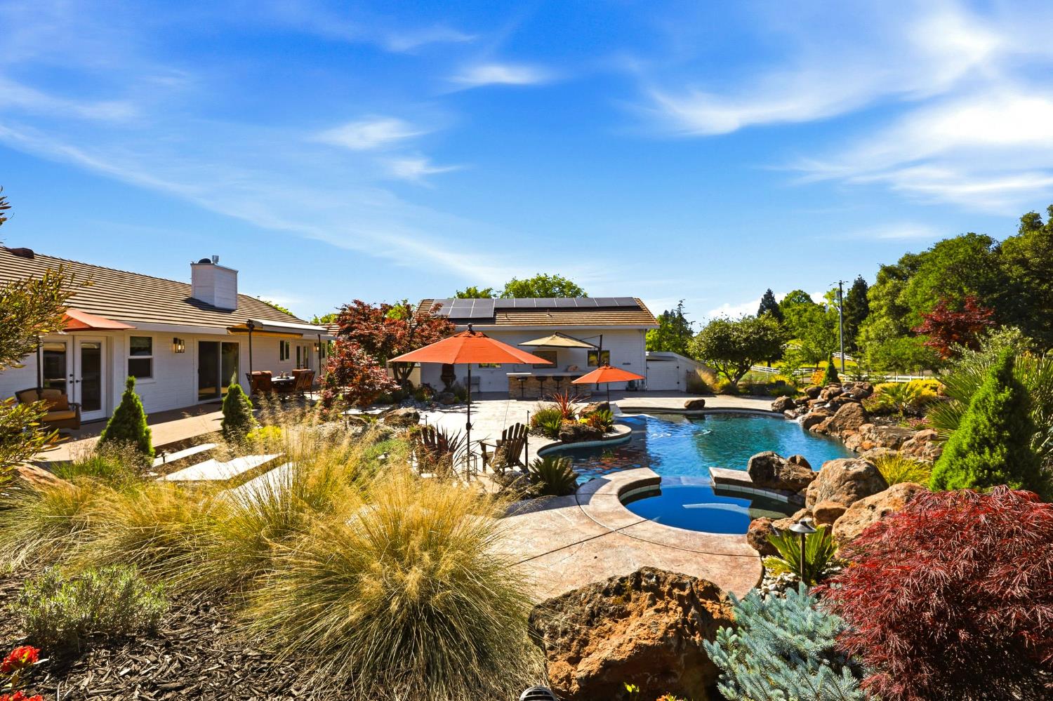 6380 Butterfield Way Placerville, CA 95667 - Photo 56 of 93 a view of a swimming pool with a patio and a yard