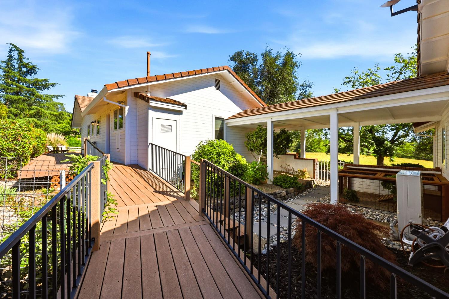 6380 Butterfield Way Placerville, CA 95667 - Photo 61 of 93 a view of a house with backyard and deck