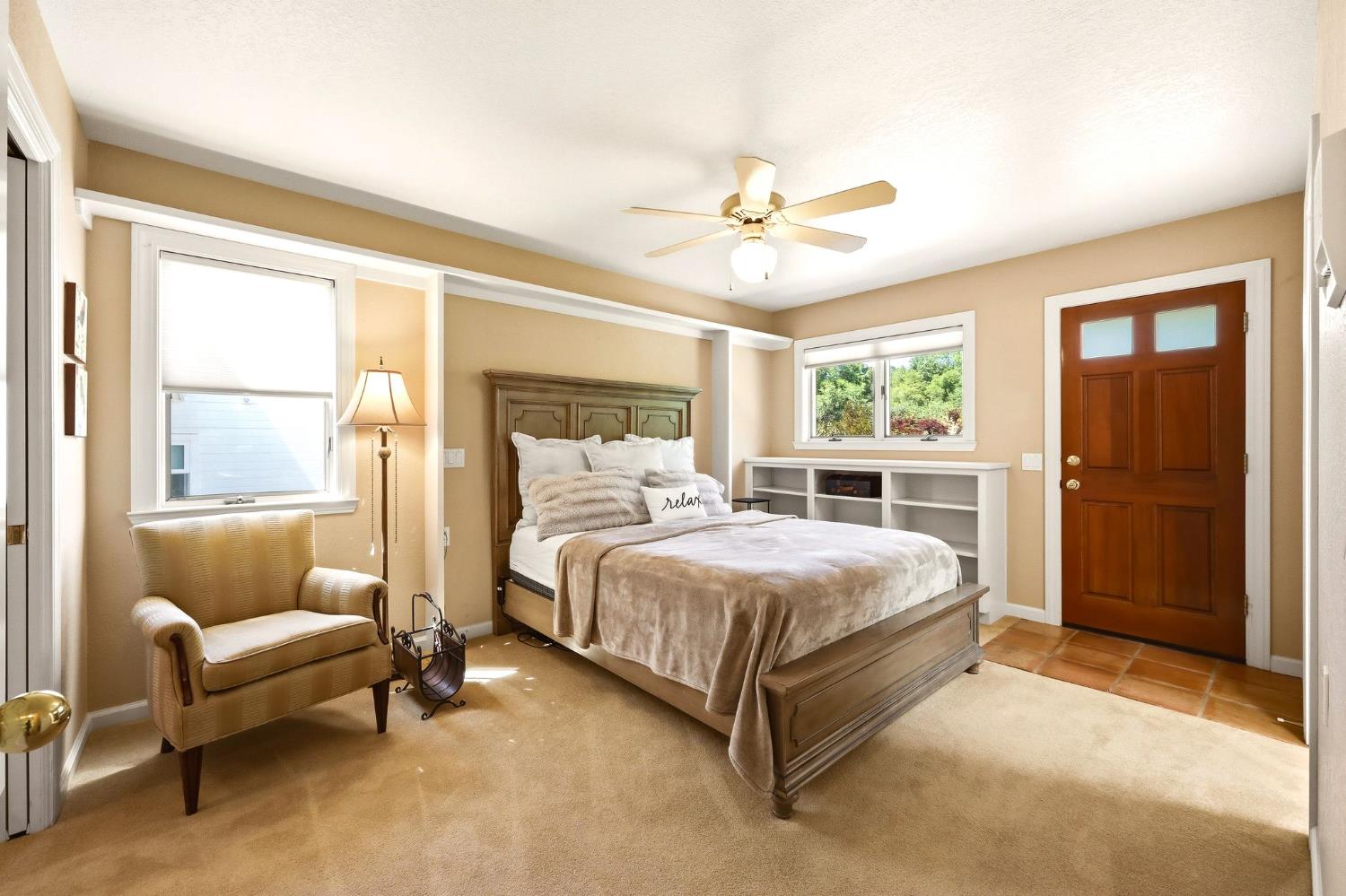 6380 Butterfield Way Placerville, CA 95667 - Photo 76 of 93 a bed room with a bed and a couch