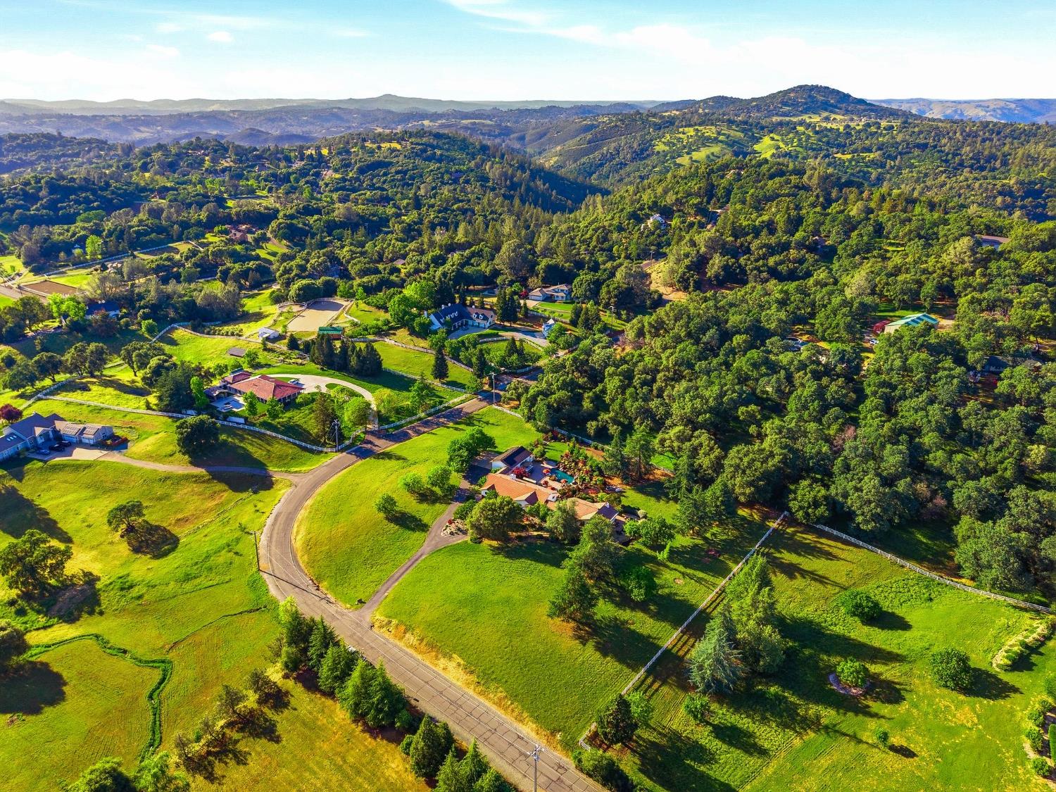 6380 Butterfield Way Placerville, CA 95667 - Photo 87 of 93 a view of a city with mountains in the background
