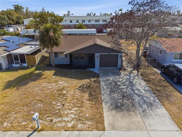 a view of a house with a yard