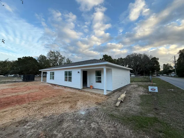a view of backyard of house