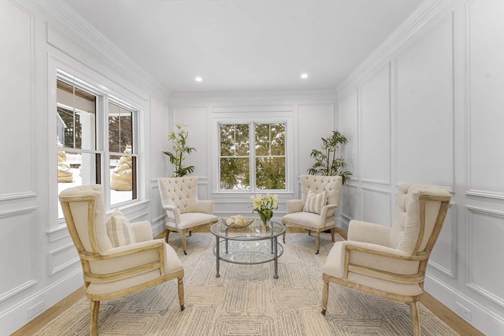 126 Prince Street Needham, MA 02492 - Photo 11 of 26 a living room with furniture and a large window