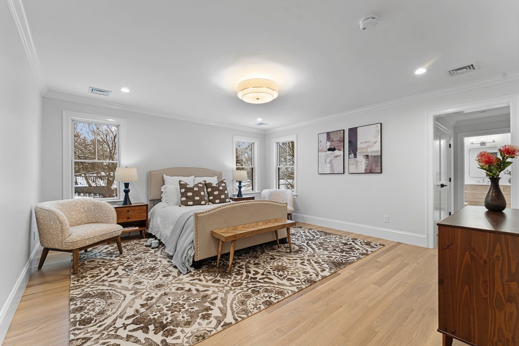 126 Prince Street Needham, MA 02492 - Photo 14 of 26 a bedroom with furniture and a wooden floor